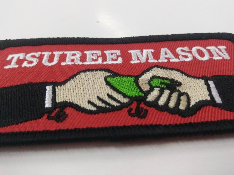 Quality PMS Color chart custom logo self adhesive fabric tsuree mason iron on backing embroidered patches wholesale