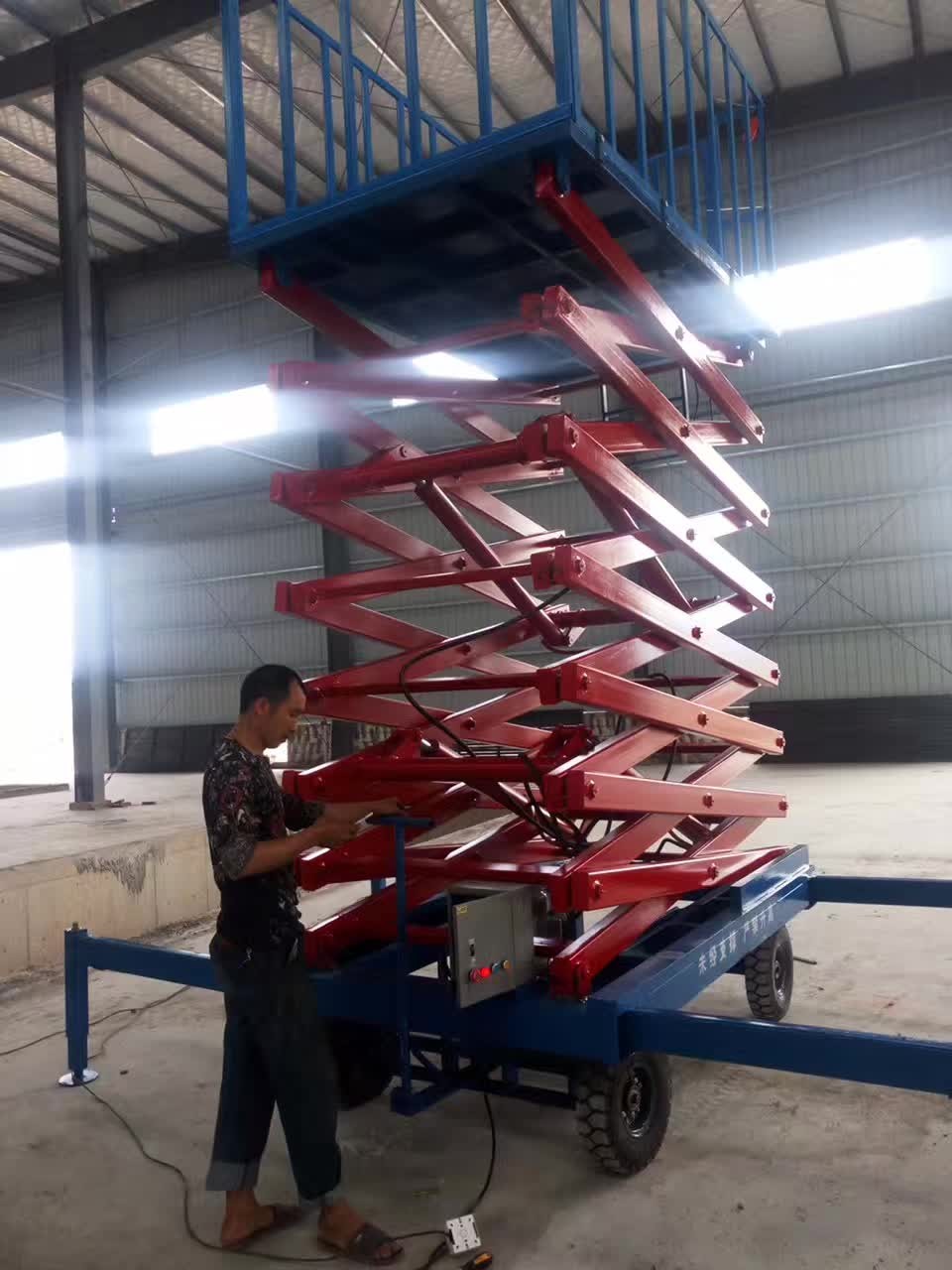 China 480kg Mobile Scissor Lift Platform 9 Meter Hydraulic Lifting Equipment on sale