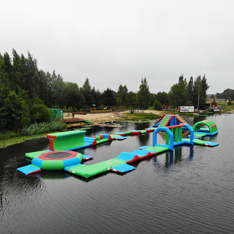 Quality Durable 0.9mm PVC Tarpaulin Inflatable Lake Water Park Green , Blue And Red Color wholesale
