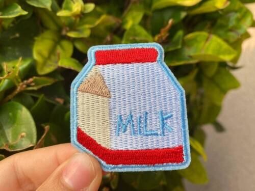 Quality Milk Custom Embroidered Patch Badge Sew On / Iron On Blue Merrow Border wholesale