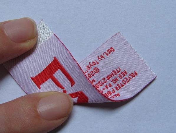 Quality No Shrinking PMS Garment Woven Iron Labels With Heat Cut Border wholesale