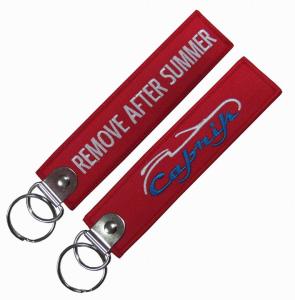 Quality Tag  Delicate Embroidered Remove Before Flight Keychain wholesale