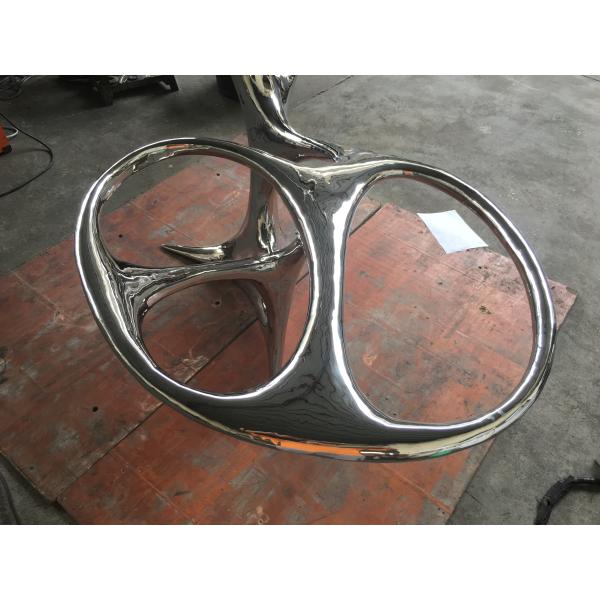 Stainless steel sculptural tables for abstract style interior decor