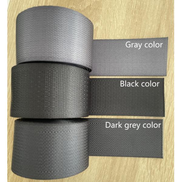 Close-up of seat belt mechanism and webbing