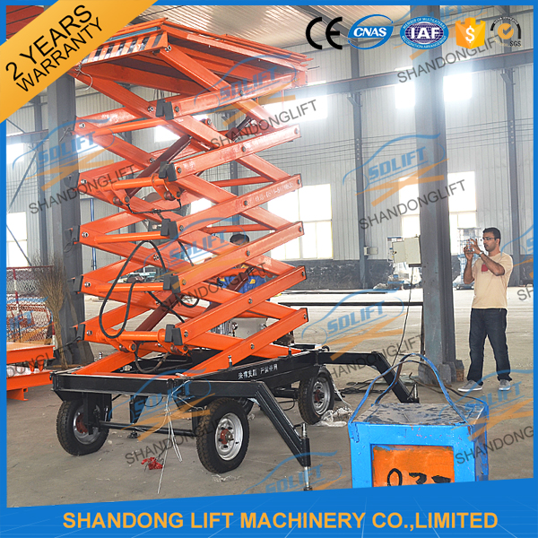 300kg 500kg Towed Mobile Mobile Platform Lift Electric Hydraulic 12m Lifting Height