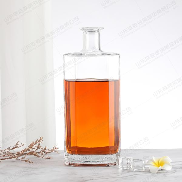 Customized 750ml End XO Transparent Glass Wine Bottle with Rubber Stopper Sealing Type