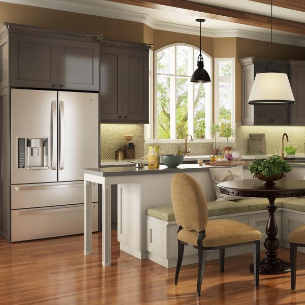 White Scandinavian pantry cabinet with brushed nickel hardware in kitchen setting