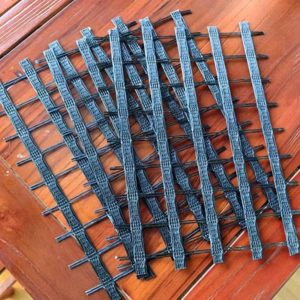 Pet Uniaxial 200-30 Kn/m Polyester Geogrid PVC Coating Slope Reinforcement Solutions Road Construction