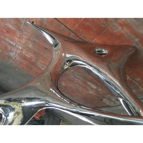 Stainless steel sculptural tables for abstract style interior decor