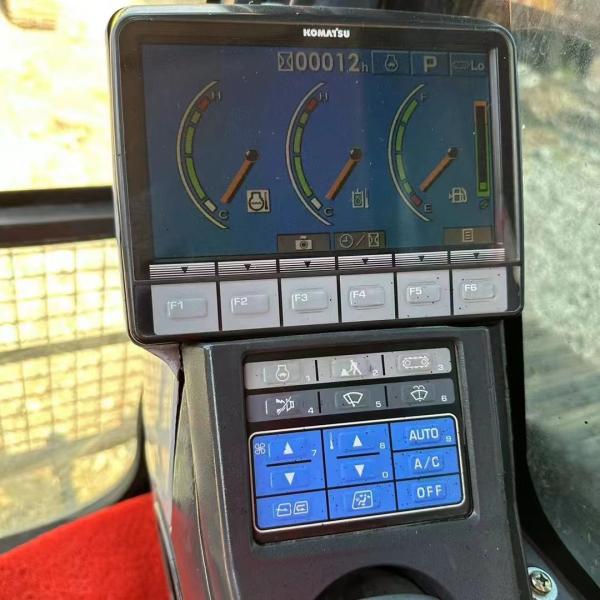 Used Komatsu PC210 crawler excavator sold at a low spot price