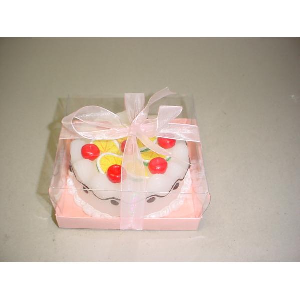 White paraffin beutiful cake candle handmade drawing packed into gift box wrapped by the silk ribbon