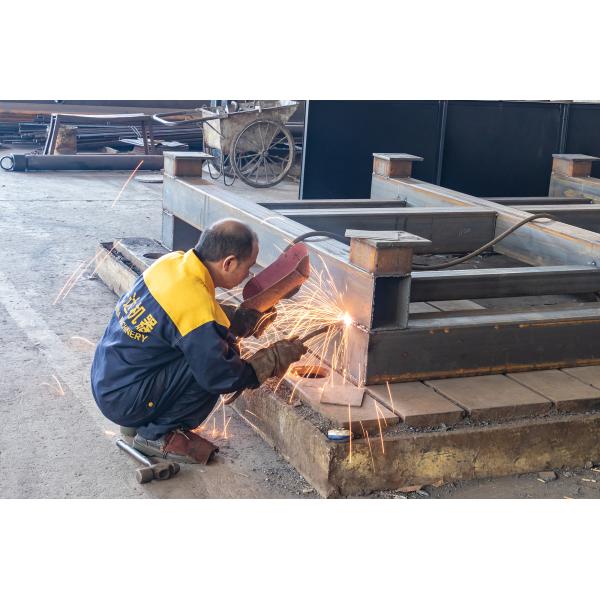 Skilled technicians assembling machinery