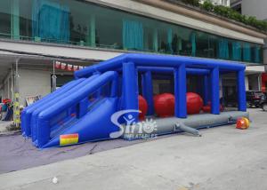 Quality Outdoor double lane adults interactive inflatable assault course with big bouncing balls wholesale