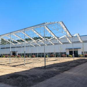 China Commercial Large Tunnel Automated Retractable Roof Plastic Film Vegetable Greenhouse on sale