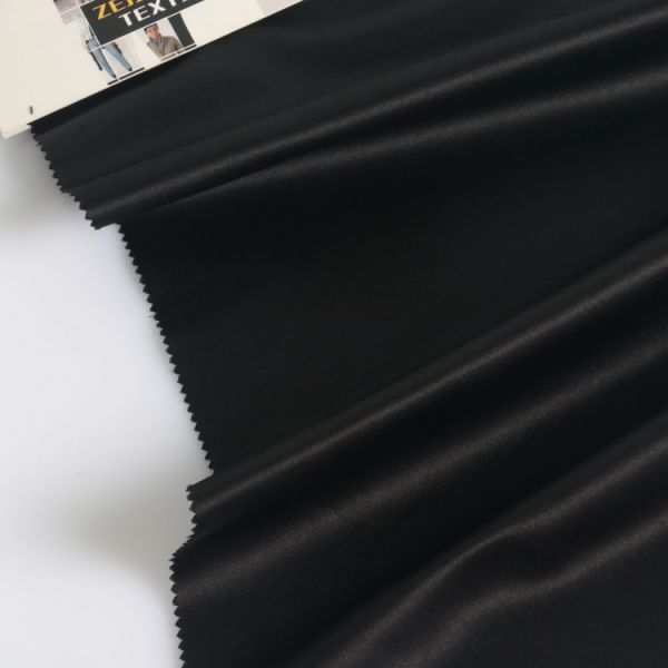 Smooth and firm down jacket/backpack recycled polymer shape memory fabric