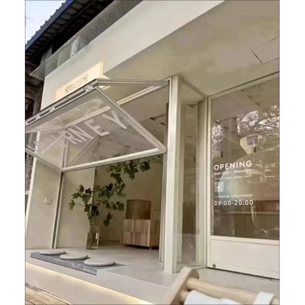 Flow Fireplace Proximity Folding Window Providing Controlled Ventilation During Wood Burning